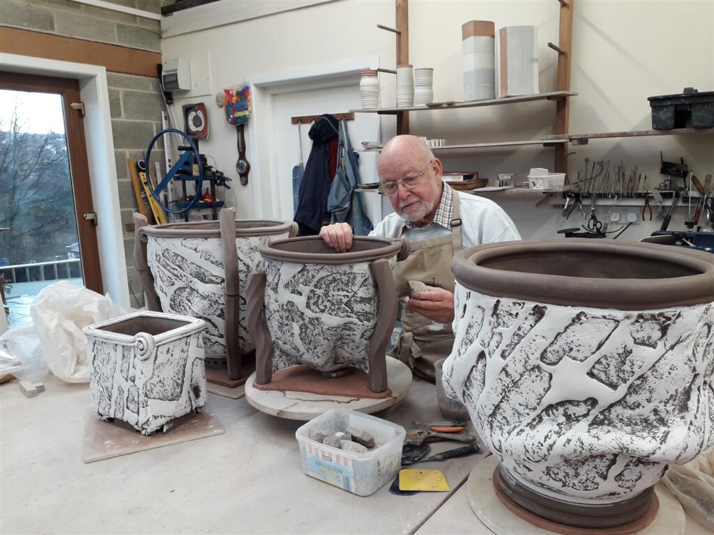 Jim working on vases